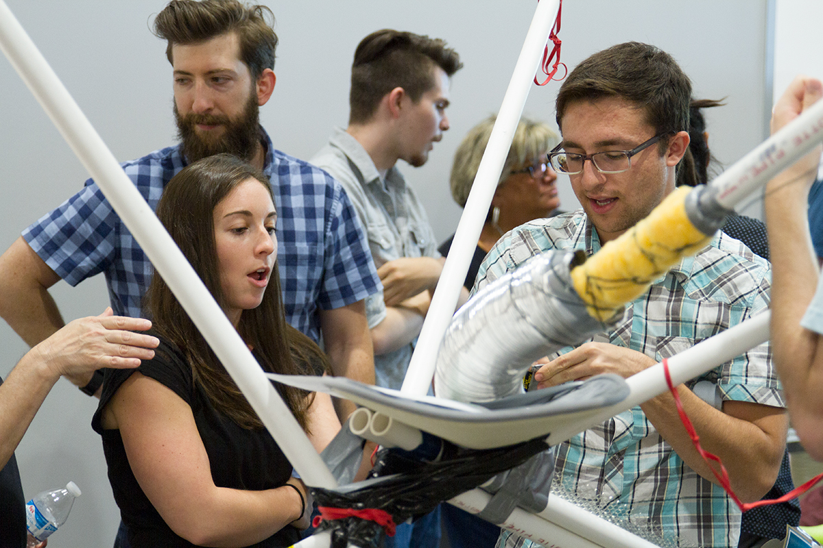 A group of StrongMinders from Team Bodacious are putting the final touches on their contraption.